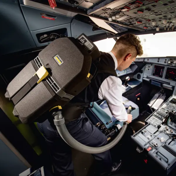 Karcher Cordless Back pack able to clean tight areas like airplane cockpit.